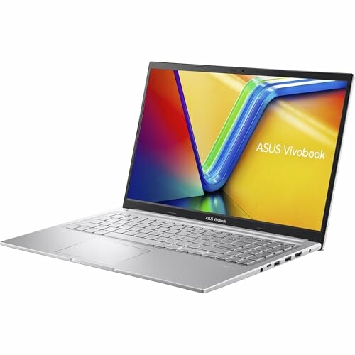 Ordinateur portable ASUS Vivobook ouvert avec écran coloré.